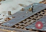 Image of Assembly of bottom shells for Liberty ship during World War 2 California United States USA, 1942, second 52 stock footage video 65675025792