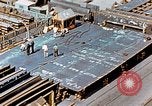 Image of Assembly of bottom shells for Liberty ship during World War 2 California United States USA, 1942, second 56 stock footage video 65675025792