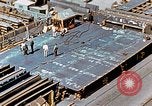 Image of Assembly of bottom shells for Liberty ship during World War 2 California United States USA, 1942, second 57 stock footage video 65675025792