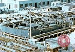 Image of Work being done on inverted deck house section of a Liberty ship  California United States USA, 1942, second 13 stock footage video 65675025793