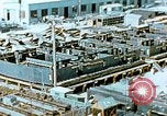 Image of Work being done on inverted deck house section of a Liberty ship  California United States USA, 1942, second 15 stock footage video 65675025793
