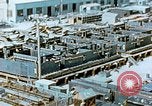 Image of Work being done on inverted deck house section of a Liberty ship  California United States USA, 1942, second 16 stock footage video 65675025793