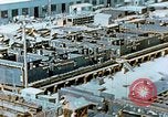 Image of Work being done on inverted deck house section of a Liberty ship  California United States USA, 1942, second 18 stock footage video 65675025793