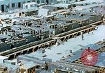 Image of Work being done on inverted deck house section of a Liberty ship  California United States USA, 1942, second 21 stock footage video 65675025793