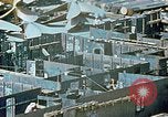 Image of Work being done on inverted deck house section of a Liberty ship  California United States USA, 1942, second 27 stock footage video 65675025793