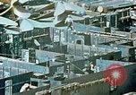 Image of Work being done on inverted deck house section of a Liberty ship  California United States USA, 1942, second 28 stock footage video 65675025793