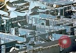 Image of Work being done on inverted deck house section of a Liberty ship  California United States USA, 1942, second 30 stock footage video 65675025793