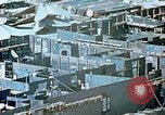 Image of Work being done on inverted deck house section of a Liberty ship  California United States USA, 1942, second 33 stock footage video 65675025793