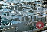 Image of Work being done on inverted deck house section of a Liberty ship  California United States USA, 1942, second 36 stock footage video 65675025793