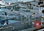 Image of Work being done on inverted deck house section of a Liberty ship  California United States USA, 1942, second 37 stock footage video 65675025793