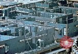Image of Work being done on inverted deck house section of a Liberty ship  California United States USA, 1942, second 40 stock footage video 65675025793