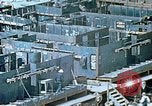 Image of Work being done on inverted deck house section of a Liberty ship  California United States USA, 1942, second 44 stock footage video 65675025793