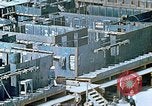 Image of Work being done on inverted deck house section of a Liberty ship  California United States USA, 1942, second 46 stock footage video 65675025793