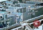 Image of Work being done on inverted deck house section of a Liberty ship  California United States USA, 1942, second 48 stock footage video 65675025793
