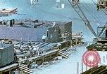 Image of Work being done on inverted deck house section of a Liberty ship  California United States USA, 1942, second 52 stock footage video 65675025793