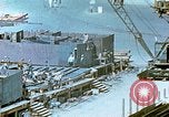 Image of Work being done on inverted deck house section of a Liberty ship  California United States USA, 1942, second 53 stock footage video 65675025793