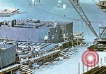 Image of Work being done on inverted deck house section of a Liberty ship  California United States USA, 1942, second 54 stock footage video 65675025793