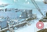 Image of Work being done on inverted deck house section of a Liberty ship  California United States USA, 1942, second 59 stock footage video 65675025793