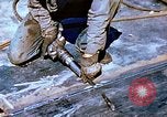 Image of Workers union melt bottom shell of Liberty ship  California United States USA, 1942, second 57 stock footage video 65675025797