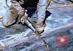 Image of Workers union melt bottom shell of Liberty ship  California United States USA, 1942, second 61 stock footage video 65675025797