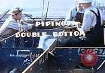Image of Welders install piping in double bottom of Liberty ship in World War 2 California United States USA, 1942, second 6 stock footage video 65675025802