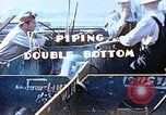 Image of Welders install piping in double bottom of Liberty ship in World War 2 California United States USA, 1942, second 8 stock footage video 65675025802