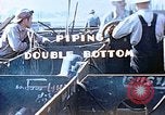 Image of Welders install piping in double bottom of Liberty ship in World War 2 California United States USA, 1942, second 9 stock footage video 65675025802