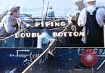 Image of Welders install piping in double bottom of Liberty ship in World War 2 California United States USA, 1942, second 10 stock footage video 65675025802