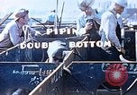 Image of Welders install piping in double bottom of Liberty ship in World War 2 California United States USA, 1942, second 13 stock footage video 65675025802