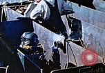 Image of Welders install piping in double bottom of Liberty ship in World War 2 California United States USA, 1942, second 40 stock footage video 65675025802