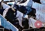 Image of Welders install piping in double bottom of Liberty ship in World War 2 California United States USA, 1942, second 45 stock footage video 65675025802
