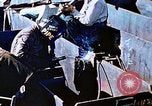 Image of Welders install piping in double bottom of Liberty ship in World War 2 California United States USA, 1942, second 52 stock footage video 65675025802