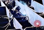 Image of Welders install piping in double bottom of Liberty ship in World War 2 California United States USA, 1942, second 58 stock footage video 65675025802
