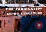 Image of Shipyard workers prefabricating Liberty Ship superstructure California United States USA, 1942, second 1 stock footage video 65675025803