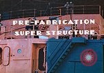 Image of Shipyard workers prefabricating Liberty Ship superstructure California United States USA, 1942, second 4 stock footage video 65675025803