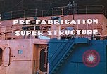 Image of Shipyard workers prefabricating Liberty Ship superstructure California United States USA, 1942, second 9 stock footage video 65675025803