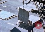 Image of Shipyard workers prefabricating Liberty Ship superstructure California United States USA, 1942, second 59 stock footage video 65675025803