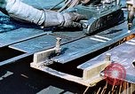 Image of Double torch cutting deck plates for Liberty ship under construction California United States USA, 1942, second 16 stock footage video 65675025804