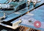 Image of Double torch cutting deck plates for Liberty ship under construction California United States USA, 1942, second 21 stock footage video 65675025804