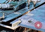 Image of Double torch cutting deck plates for Liberty ship under construction California United States USA, 1942, second 23 stock footage video 65675025804