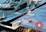 Image of Double torch cutting deck plates for Liberty ship under construction California United States USA, 1942, second 24 stock footage video 65675025804
