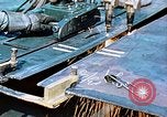 Image of Double torch cutting deck plates for Liberty ship under construction California United States USA, 1942, second 25 stock footage video 65675025804