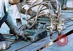 Image of Double torch cutting deck plates for Liberty ship under construction California United States USA, 1942, second 29 stock footage video 65675025804