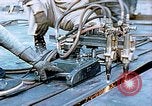 Image of Double torch cutting deck plates for Liberty ship under construction California United States USA, 1942, second 32 stock footage video 65675025804