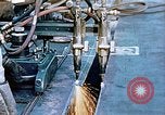 Image of Double torch cutting deck plates for Liberty ship under construction California United States USA, 1942, second 37 stock footage video 65675025804