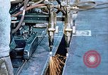 Image of Double torch cutting deck plates for Liberty ship under construction California United States USA, 1942, second 39 stock footage video 65675025804