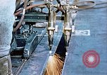 Image of Double torch cutting deck plates for Liberty ship under construction California United States USA, 1942, second 41 stock footage video 65675025804