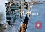 Image of Double torch cutting deck plates for Liberty ship under construction California United States USA, 1942, second 42 stock footage video 65675025804