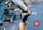 Image of Double torch cutting deck plates for Liberty ship under construction California United States USA, 1942, second 46 stock footage video 65675025804