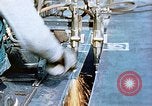 Image of Double torch cutting deck plates for Liberty ship under construction California United States USA, 1942, second 50 stock footage video 65675025804